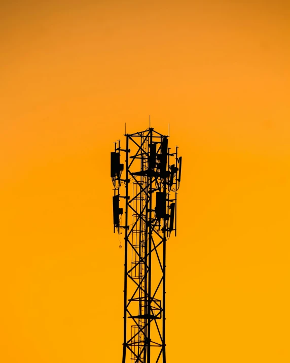 a tower with four antennas near one another