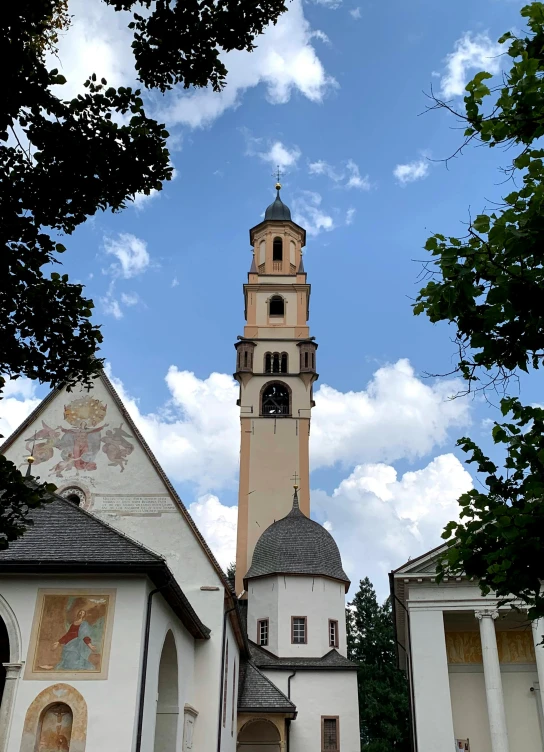 the large cathedral has an interesting bell tower