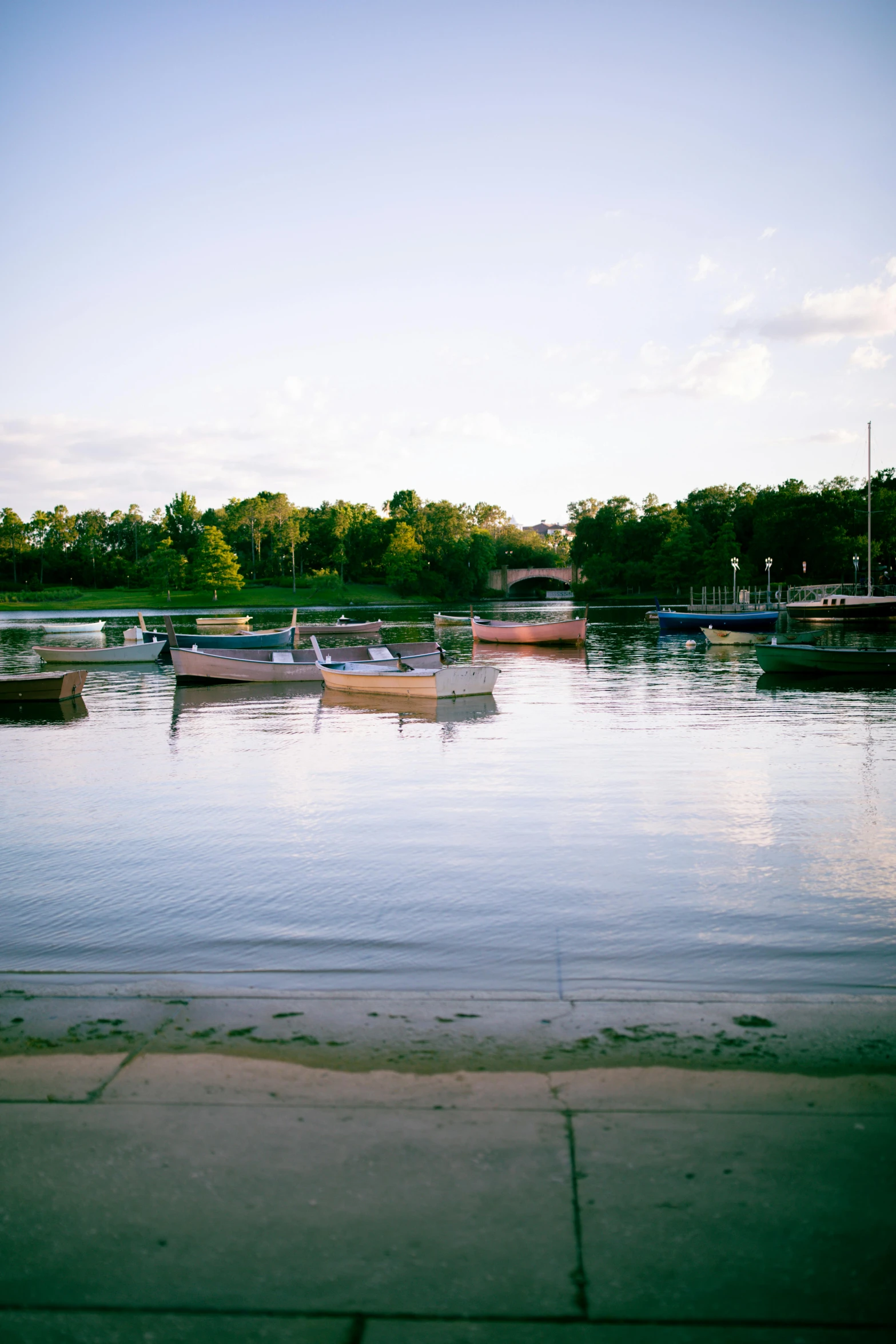 many boats are sitting on the water by itself