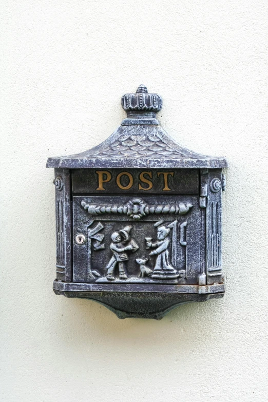 a small wall mounted mailbox that is displaying the date of it's post