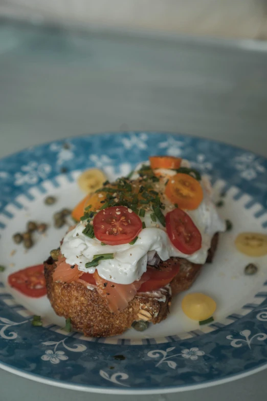 a blue and white plate with food on it