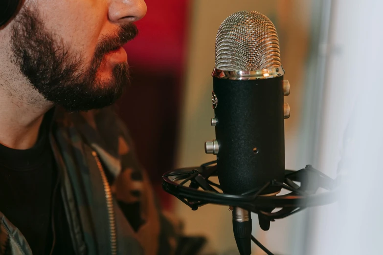 a man with a microphone and headphones