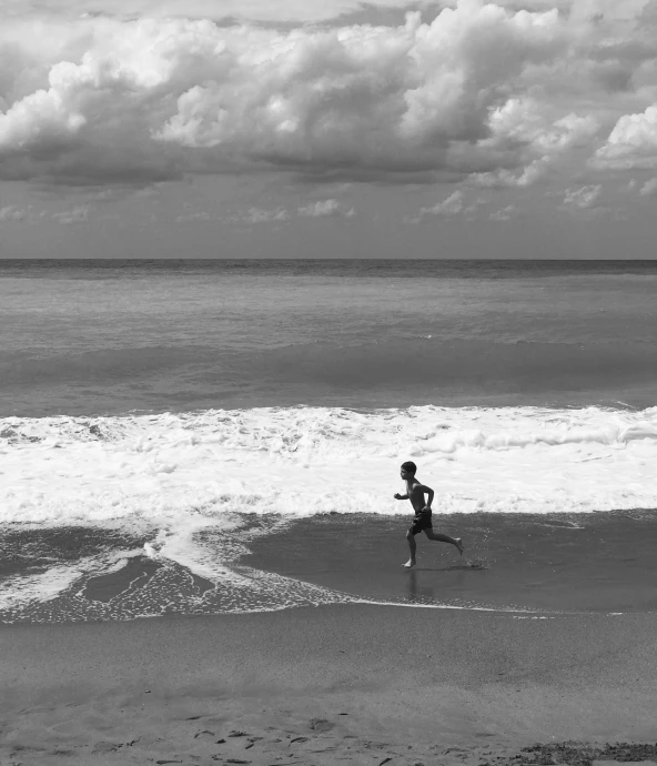 a  on the beach with his kite flying