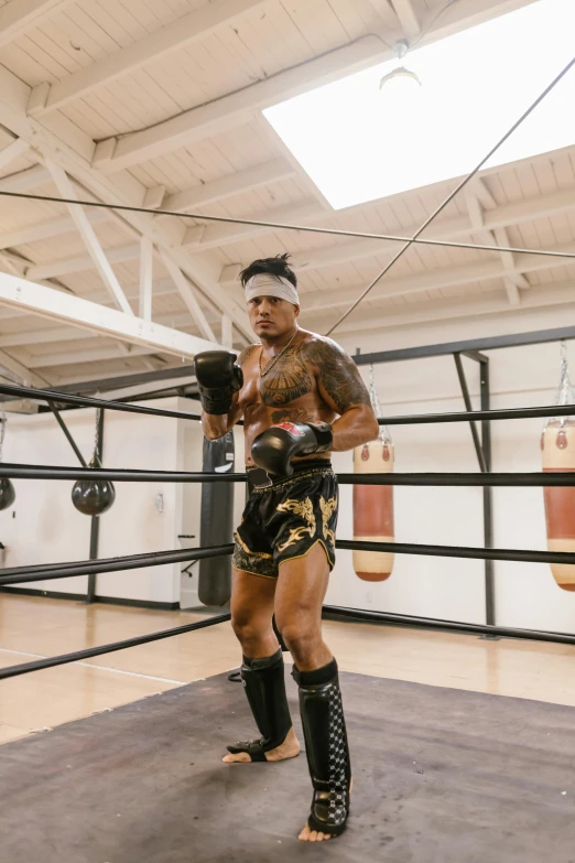 a professional boxing referee on the ring posing for a po