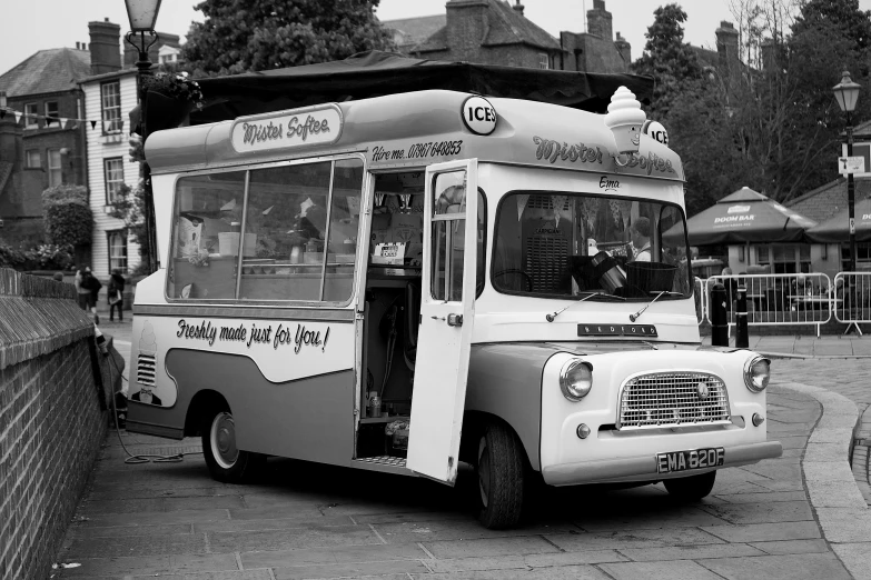 a public transit bus on the street with an open door