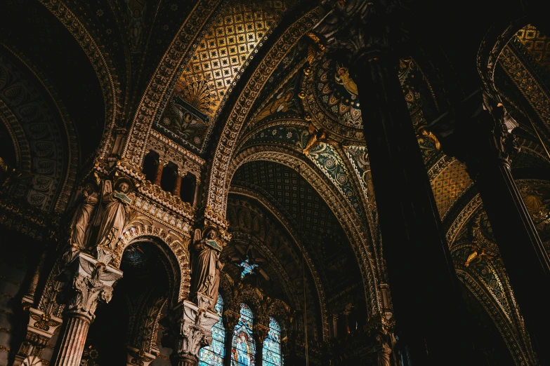 ornate gold designs adorn the cathedral walls