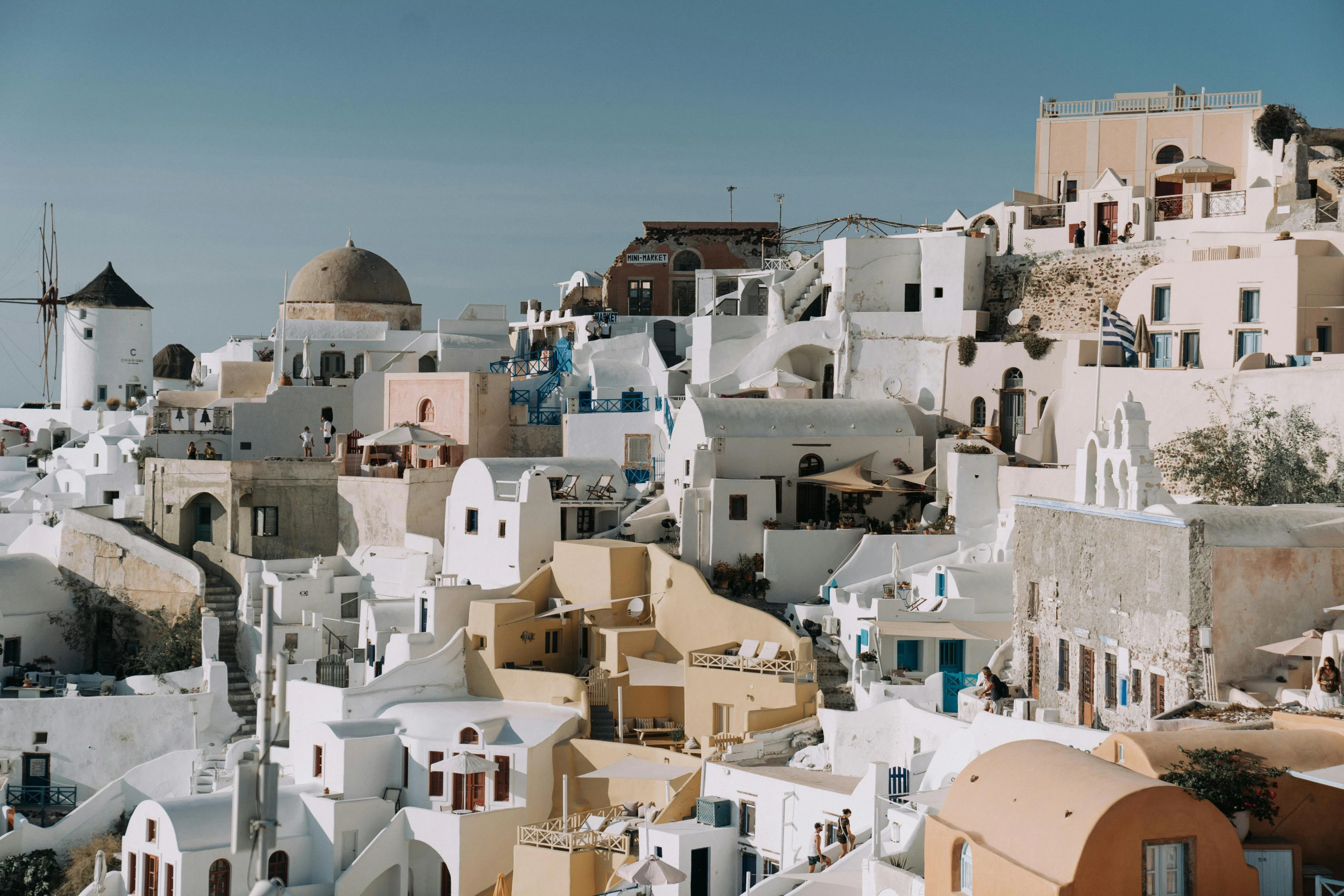 an overhead view of the colorful and white houses