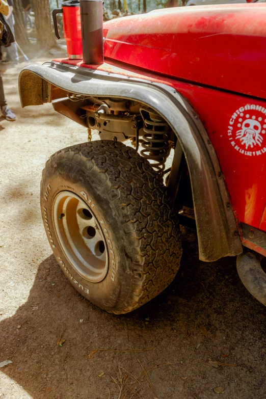 close up po of tire and front of vehicle