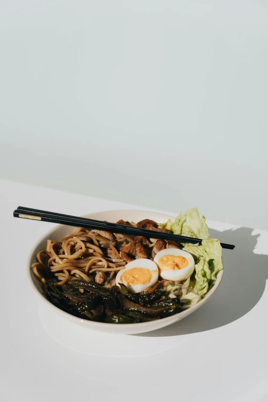 a close up of a bowl of food on a table