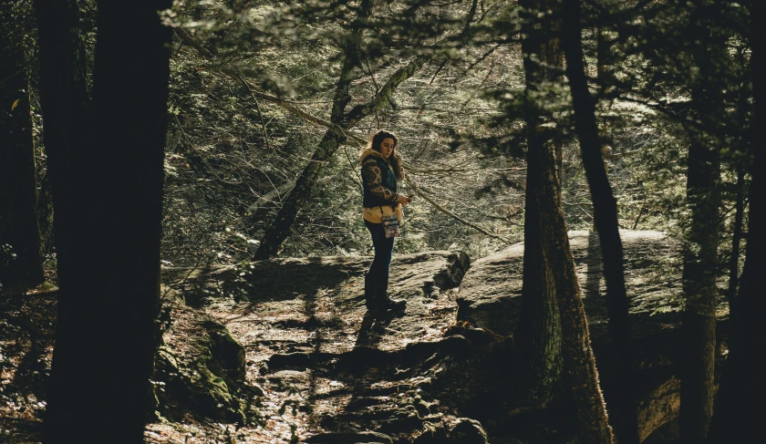 a person that is hiking through the woods