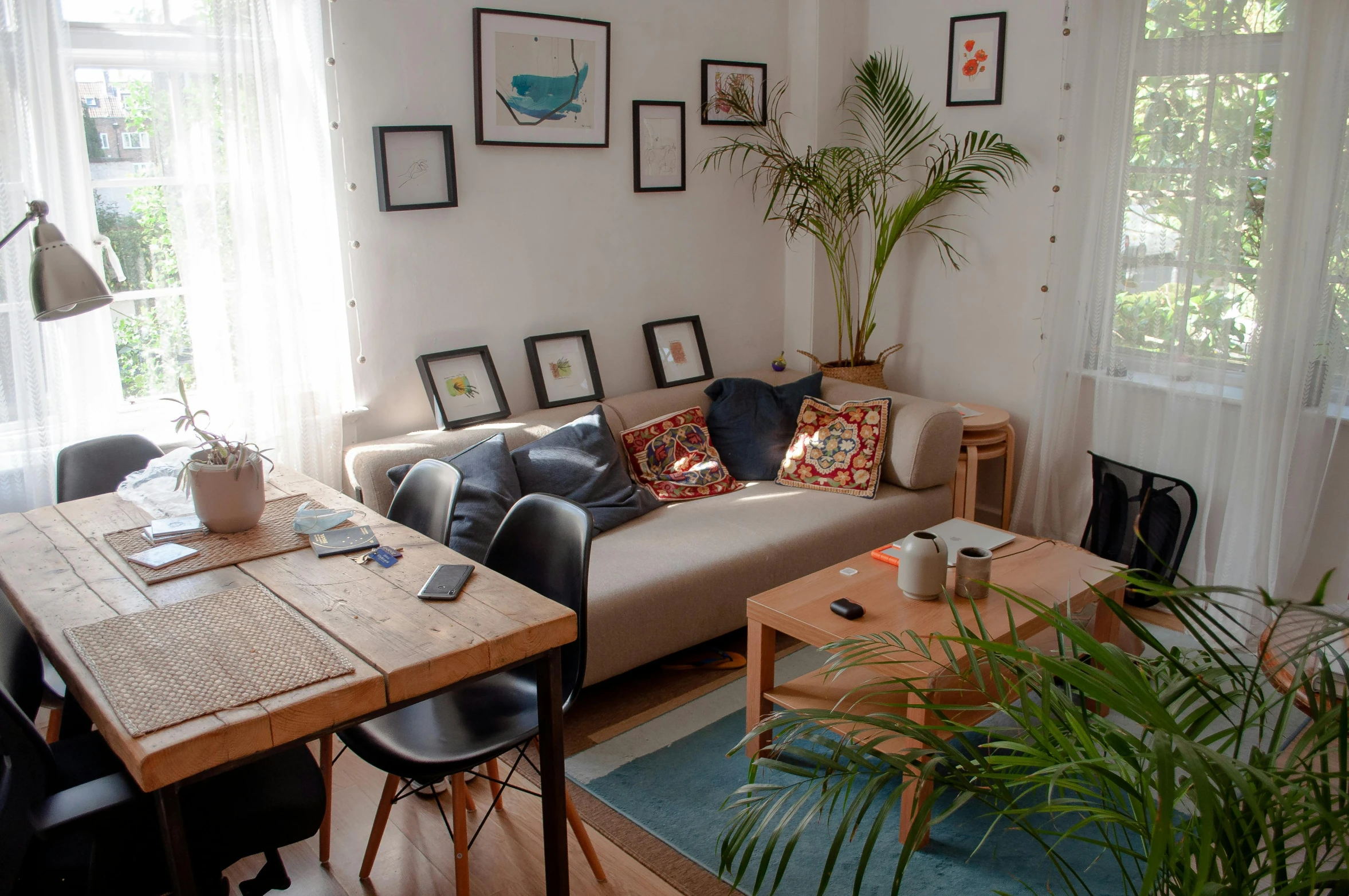 a living room filled with furniture and a table