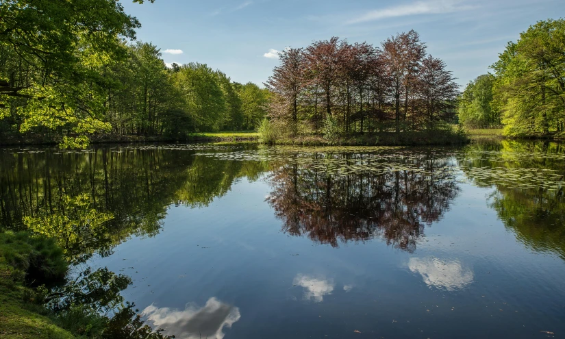 a lake with a sky reflection on it