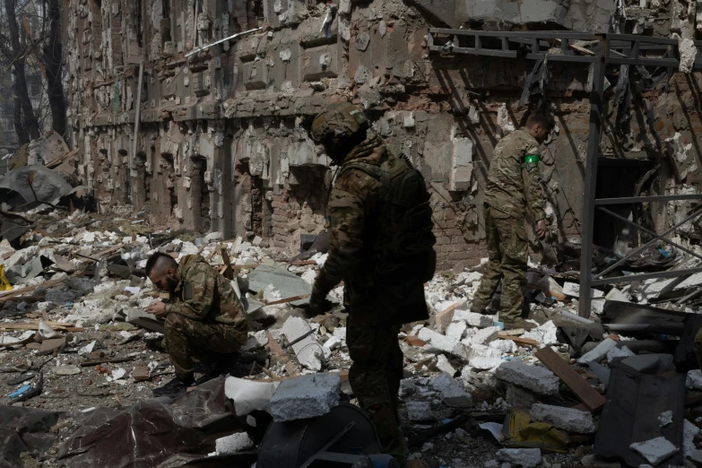 the military are looking at their debris in the city