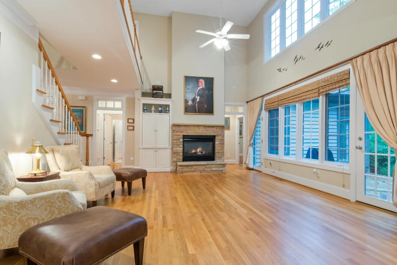 an open floor plan with a large window to allow natural light