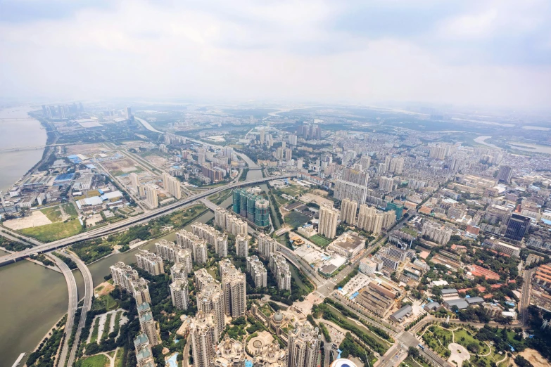 an aerial view of a city and river