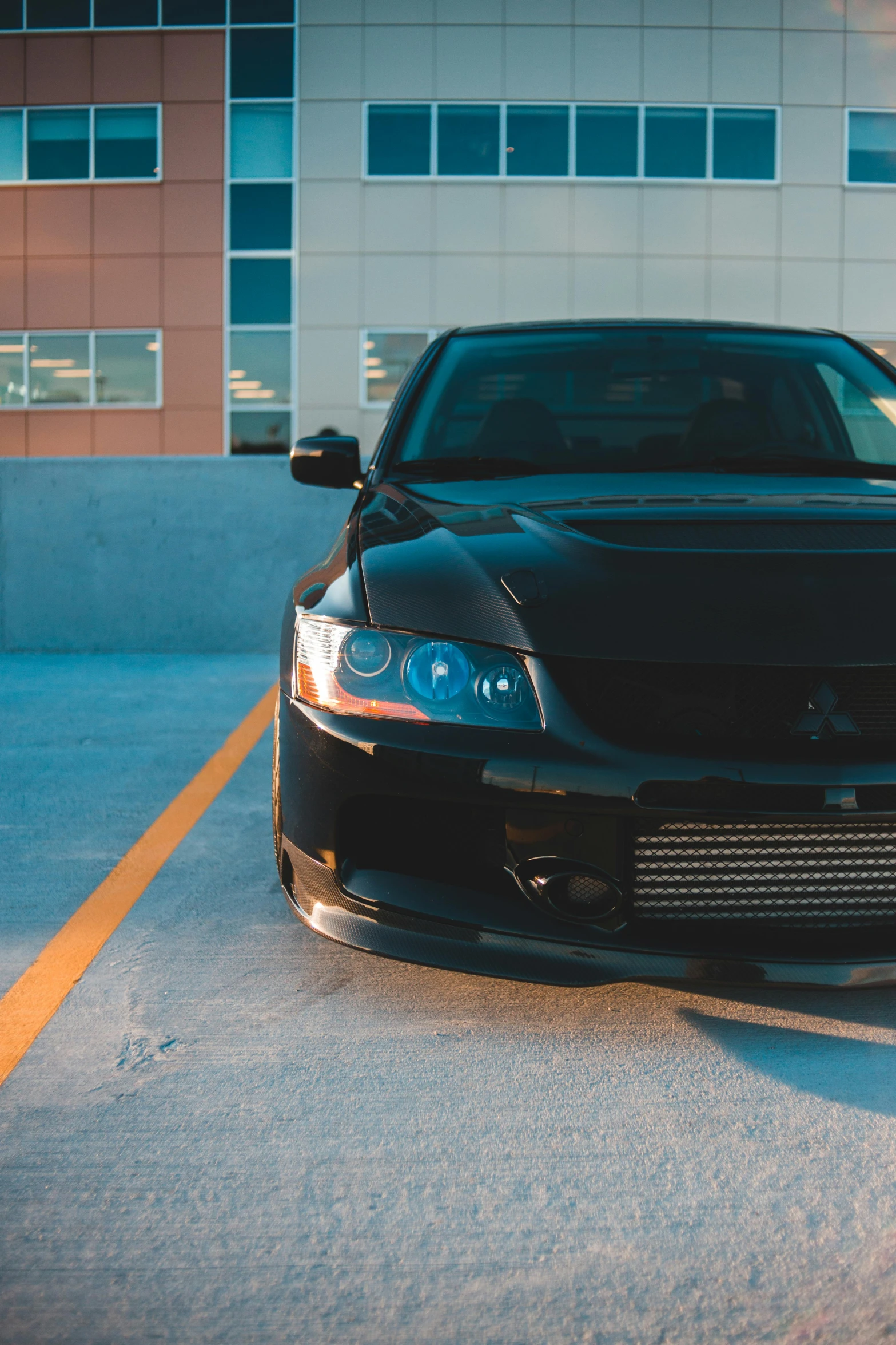 a car is parked in front of a building