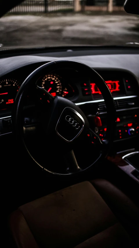 the dashboard of a car with dash lights