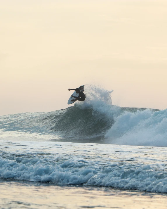 a surfer riding the crest of a wave