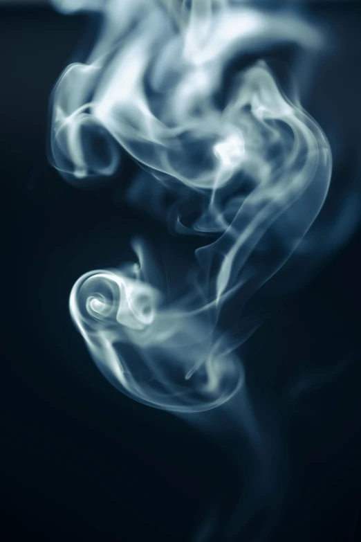 smoke in the dark and dark with a black background