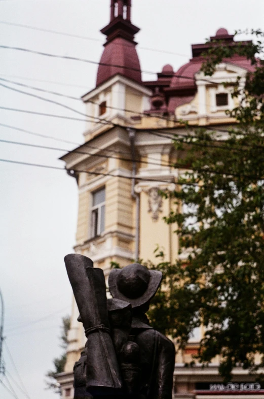 a statue sitting in the center of a large building