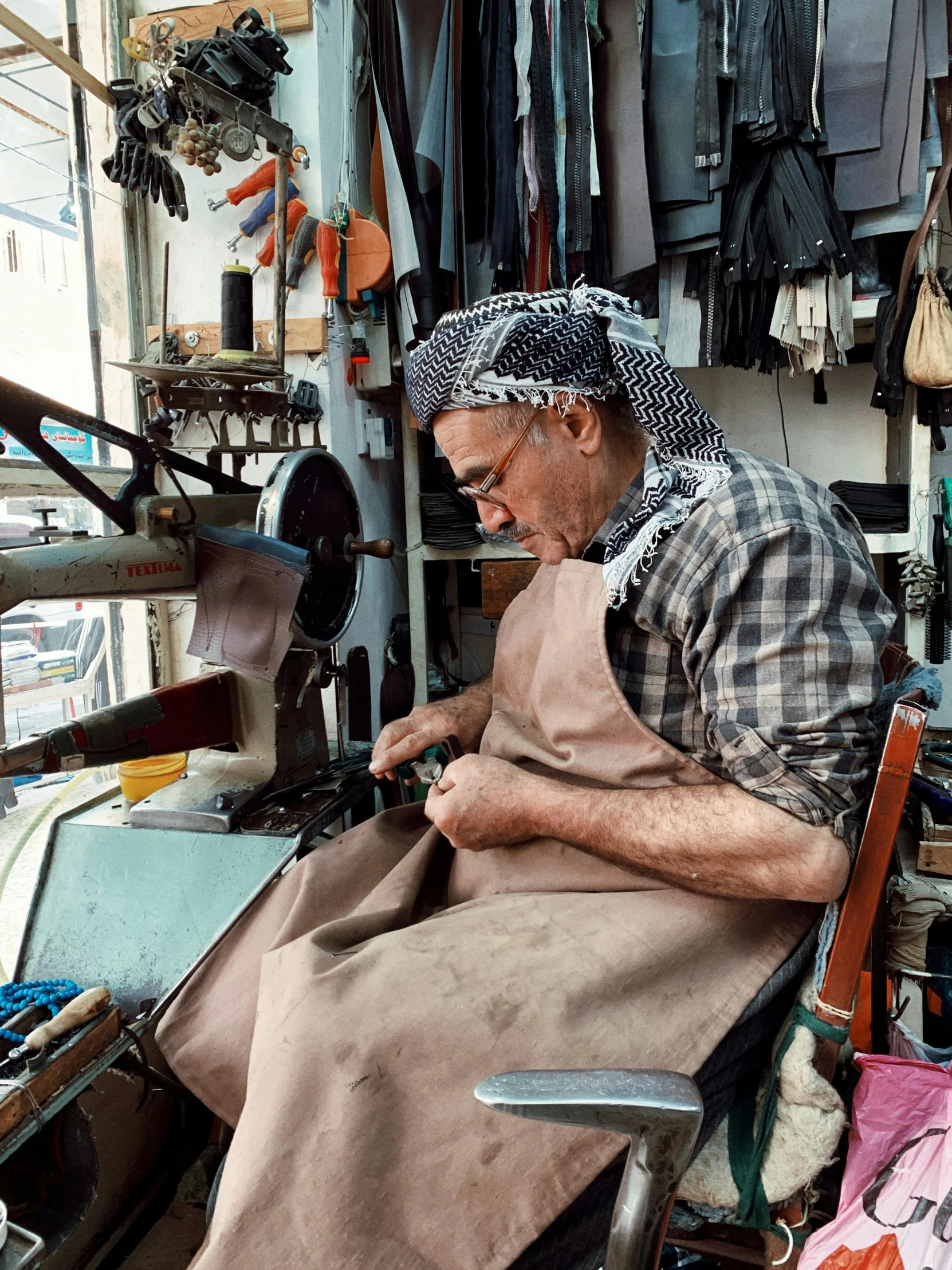 a man in a hat is  fabric