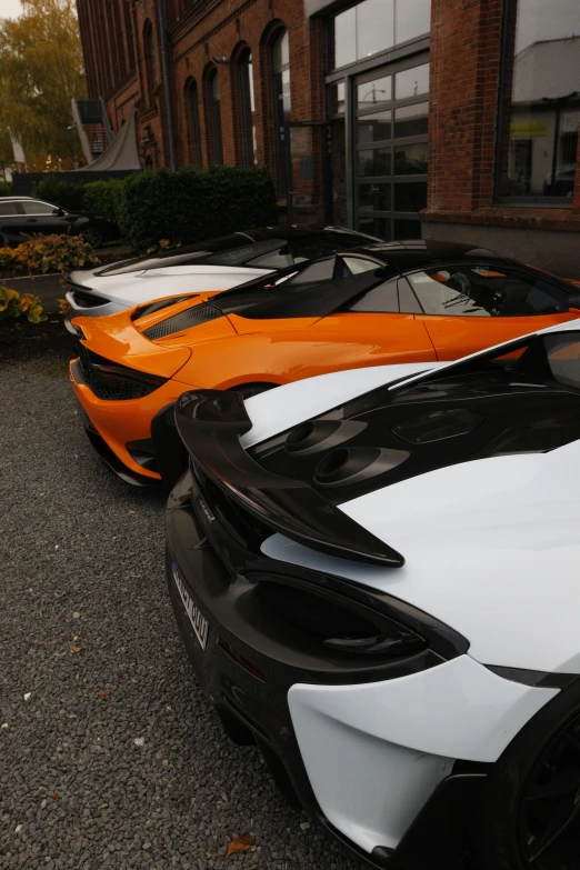 many cars that are parked in the street