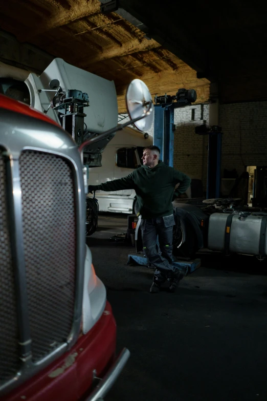 a man is on his skateboard in the garage