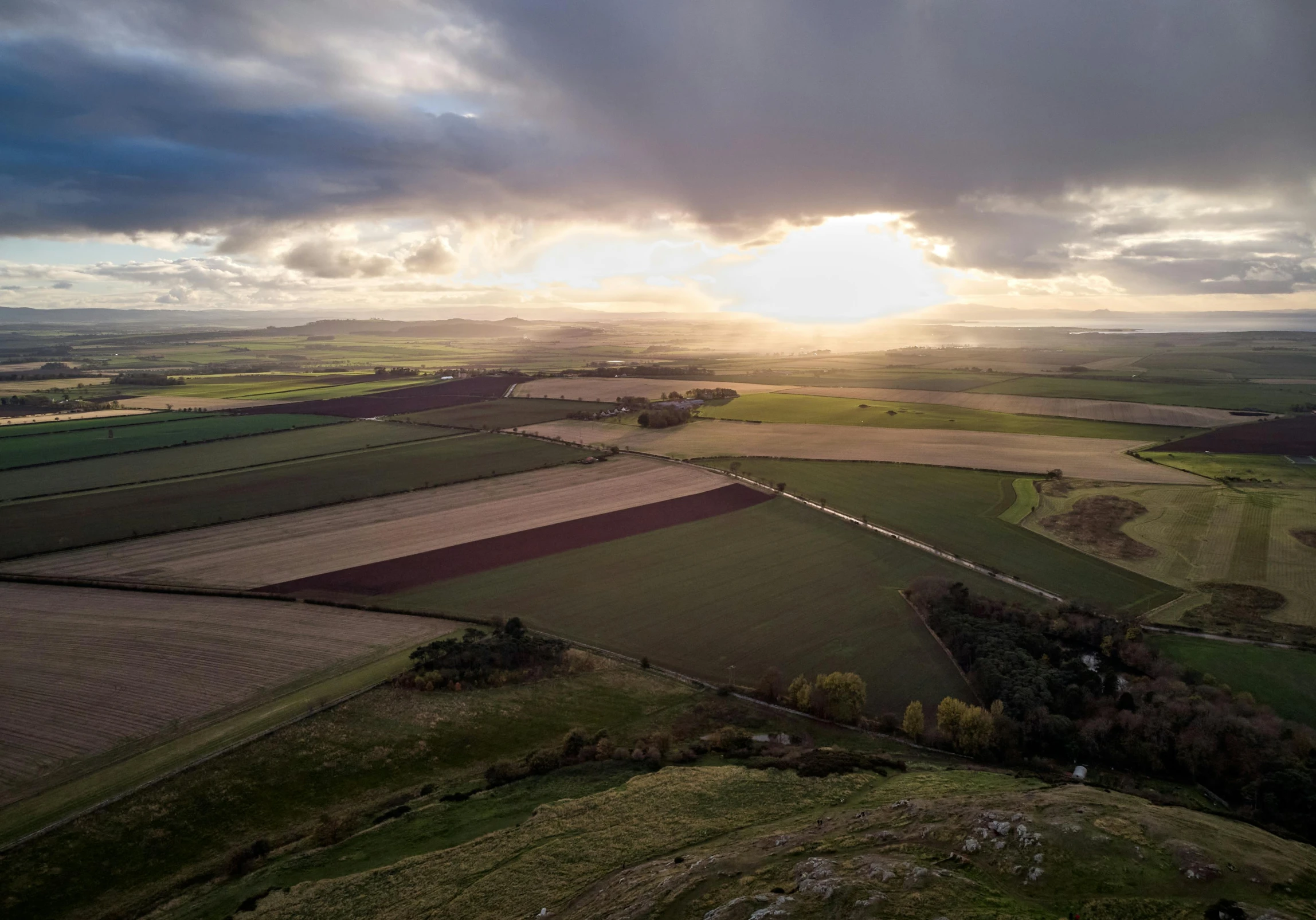 an aerial s of an agricultural field in a country