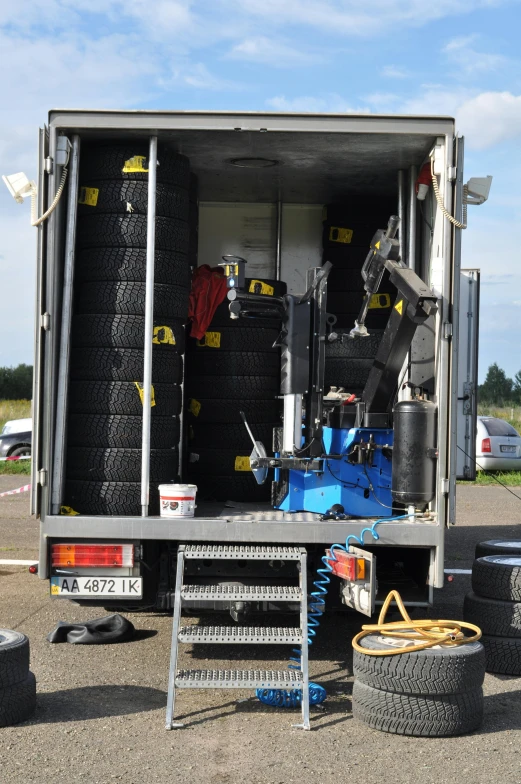 the back of a truck with the door open