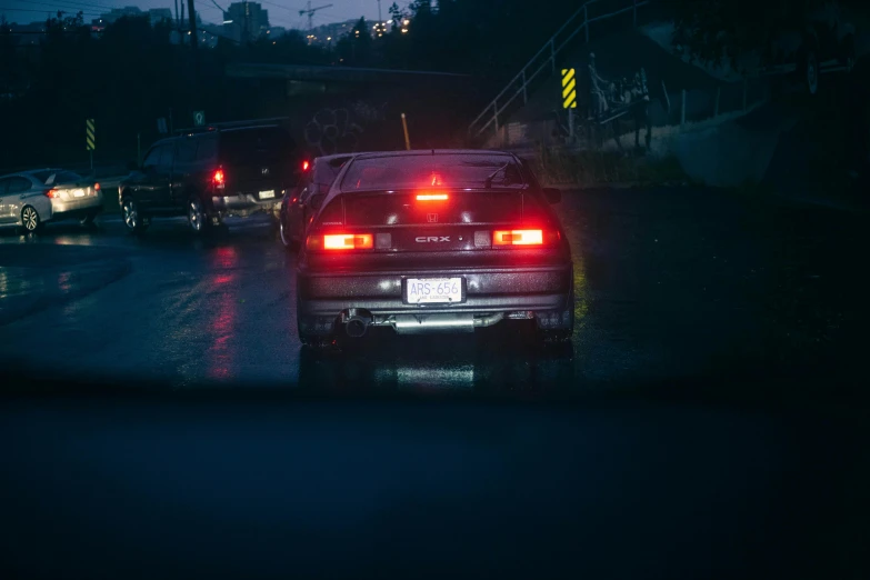 a blurry image of cars on a city street