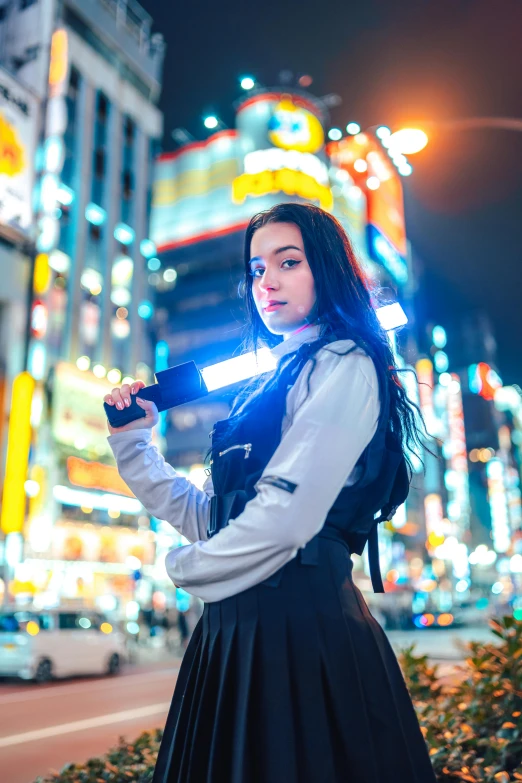 an artistic picture of a girl with a gun in her hand