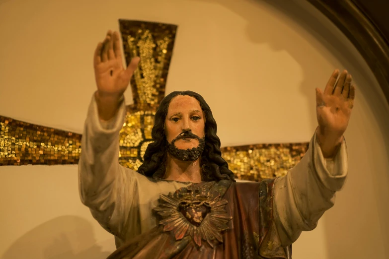 statue of jesus on the cross in a church