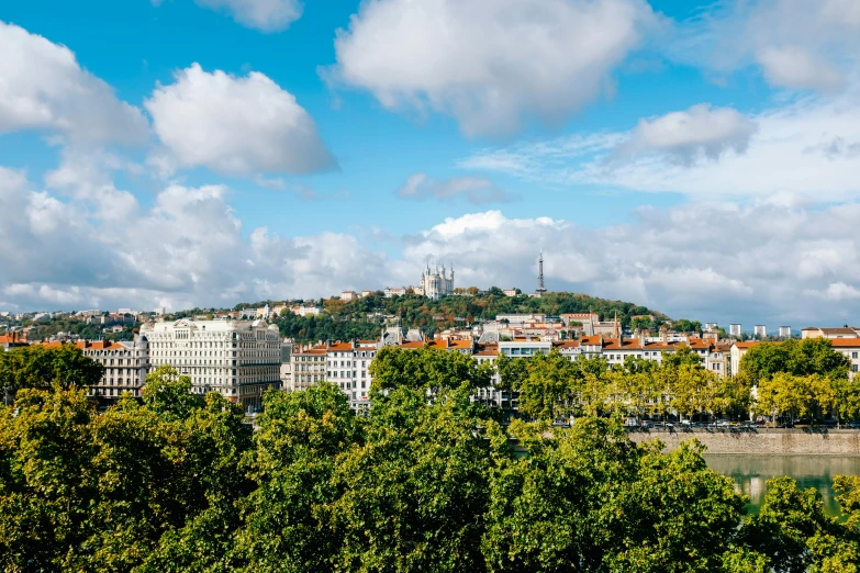 the view of a small town and a big hill