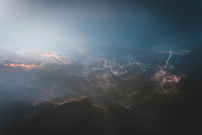 the dark sky shows a mountaintop at night