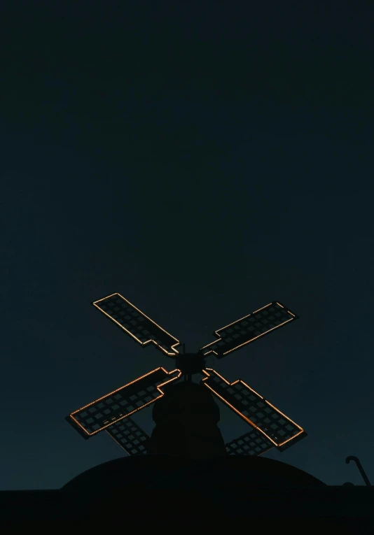 a tall clock tower sitting below a dark sky