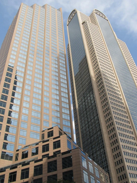 a very tall set of three building next to each other