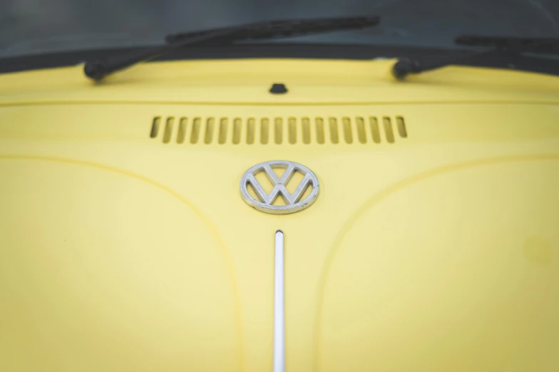 a vw car with the hood up