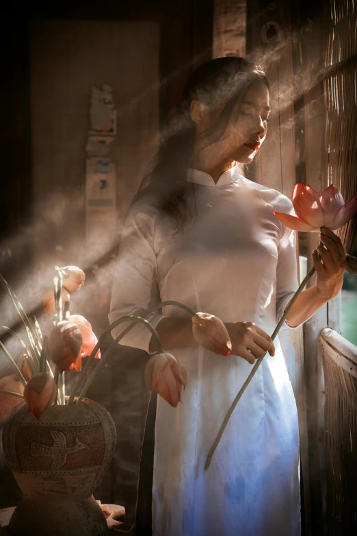 woman in white dress preparing food with a spoon