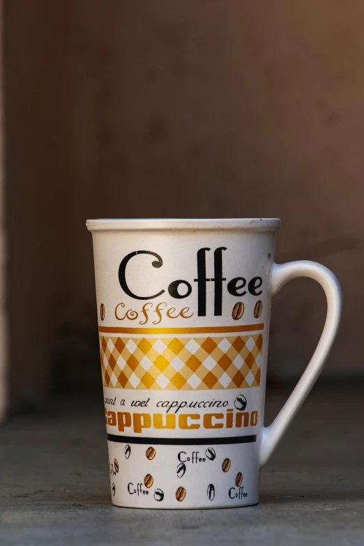 a coffee cup that has a coffee cup on it