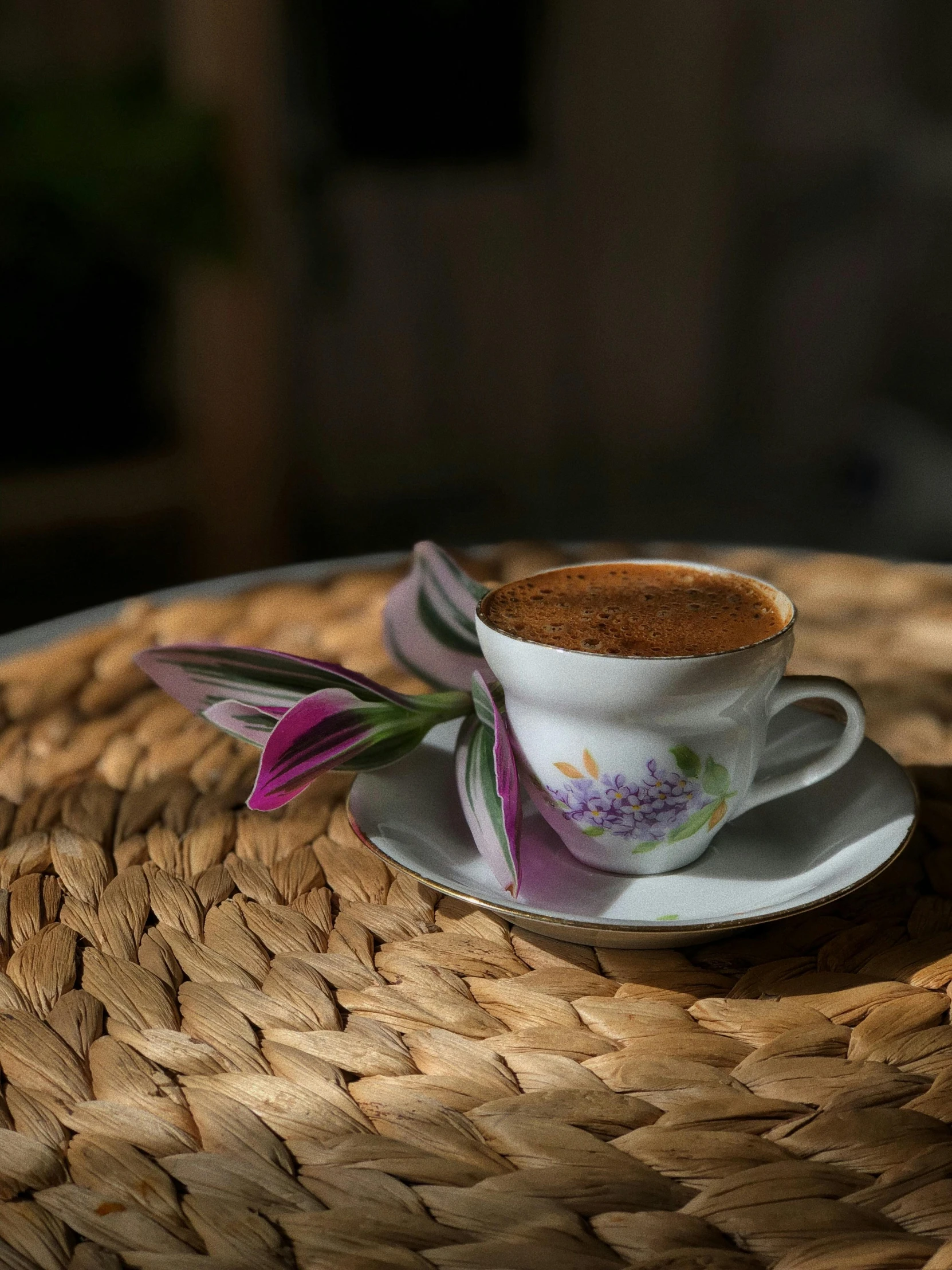 a close up of a cup on a saucer