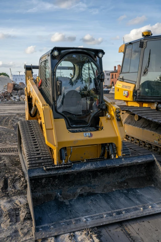 construction equipment sitting in a pile on the ground