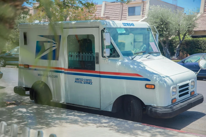 a delivery truck is shown parked at an intersection