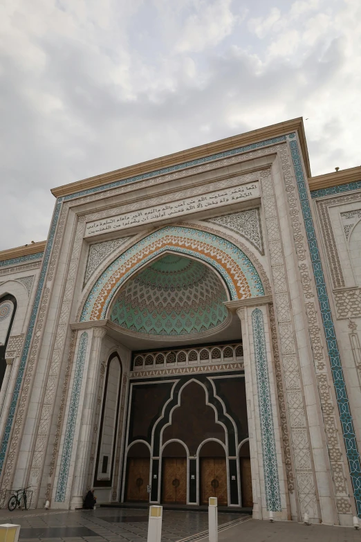 ornate archway with decorative designs outside a building