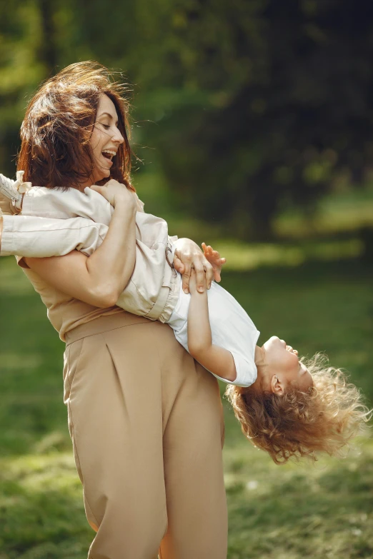 a mother with her child playing outside