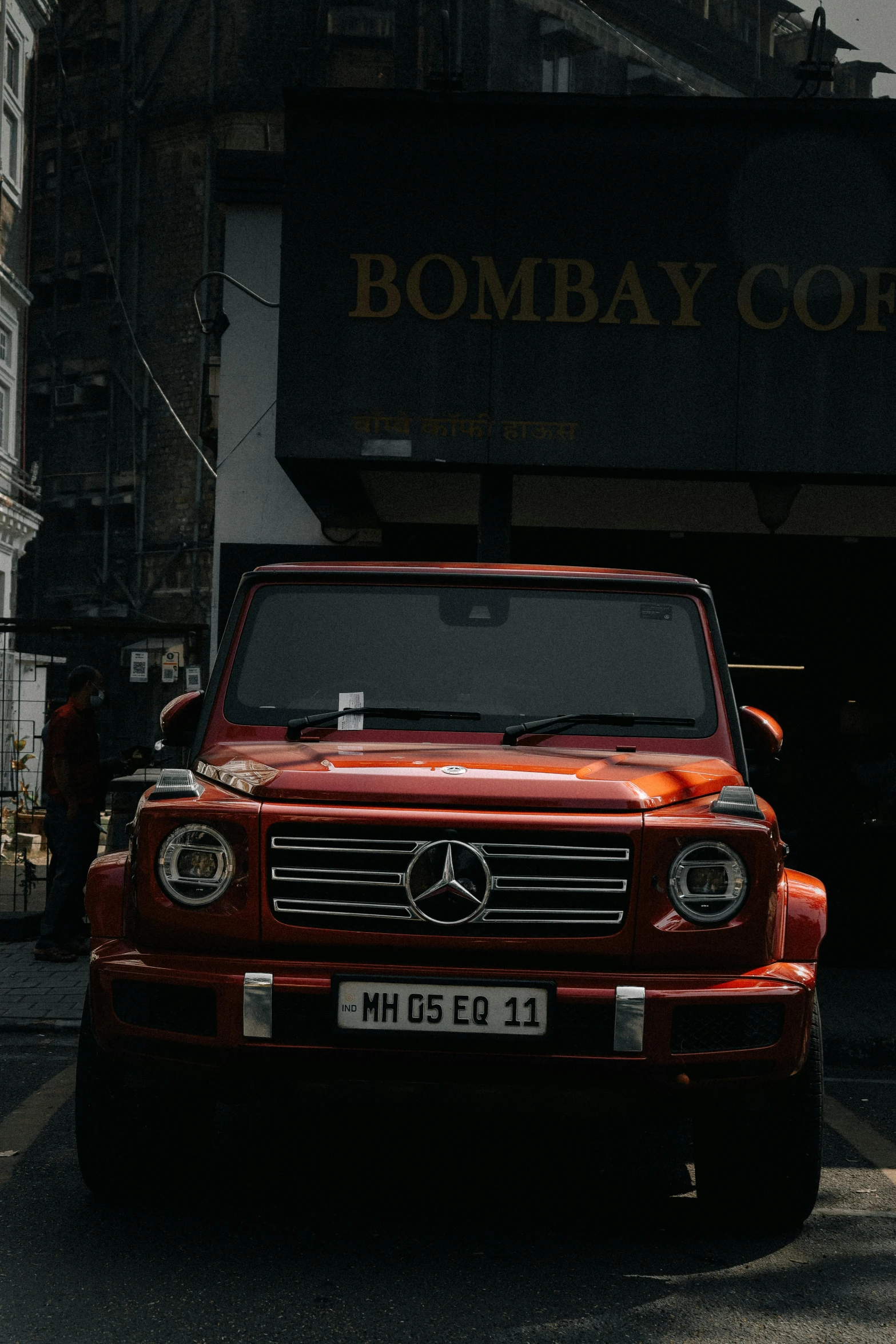 a mercedes car parked at a bomb bay company