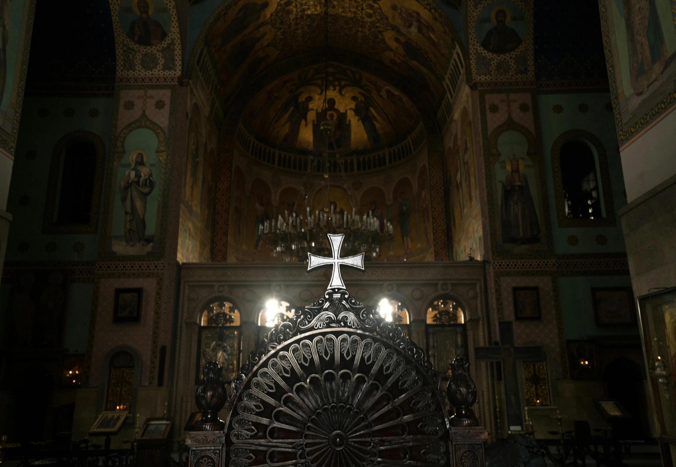 a cathedral with vaulted ceilings and ornate pews