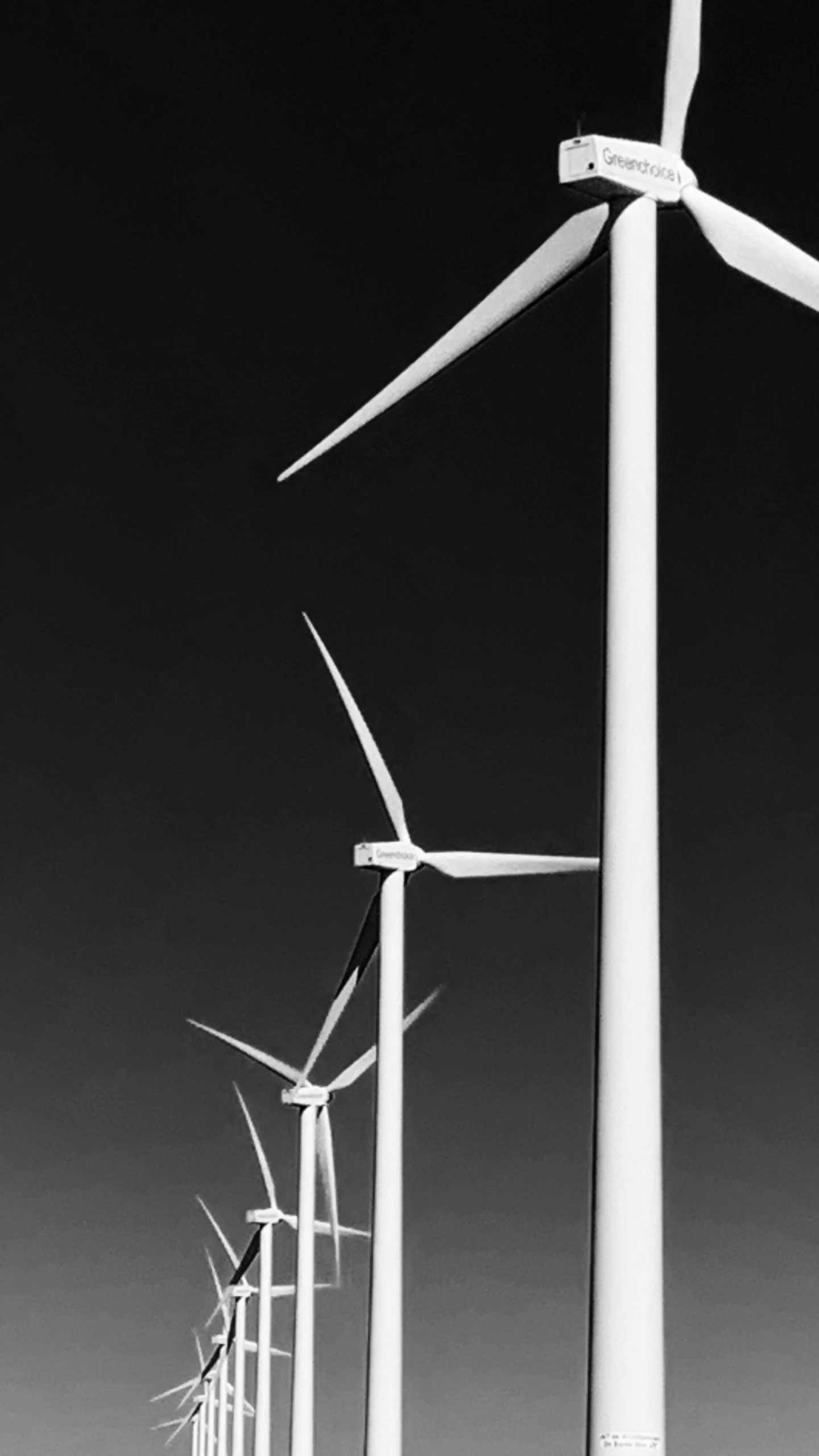 there are many wind mills in this black and white po