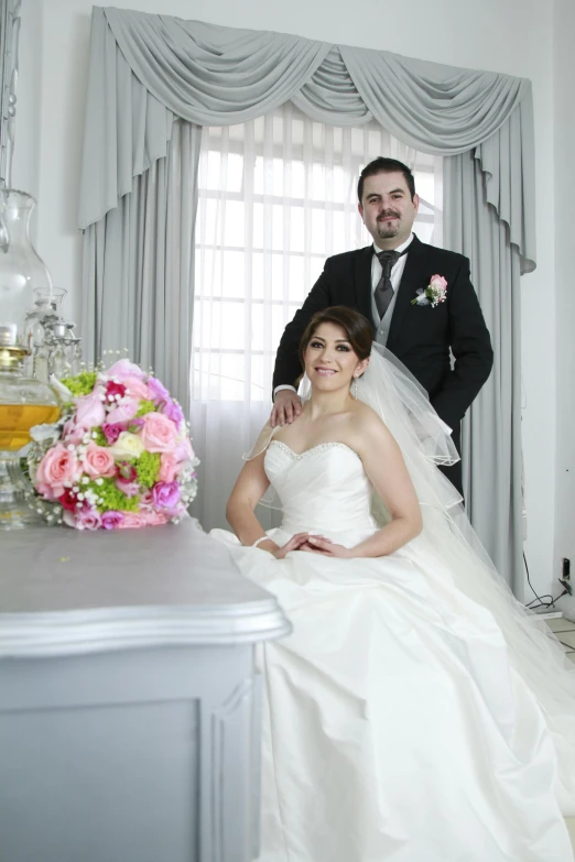 two brides are posing together for the camera