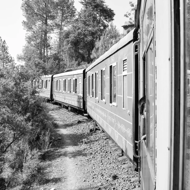 black and white po of an old passenger train