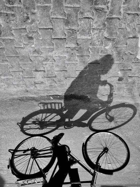 a black and white po of a bicycle on the ground